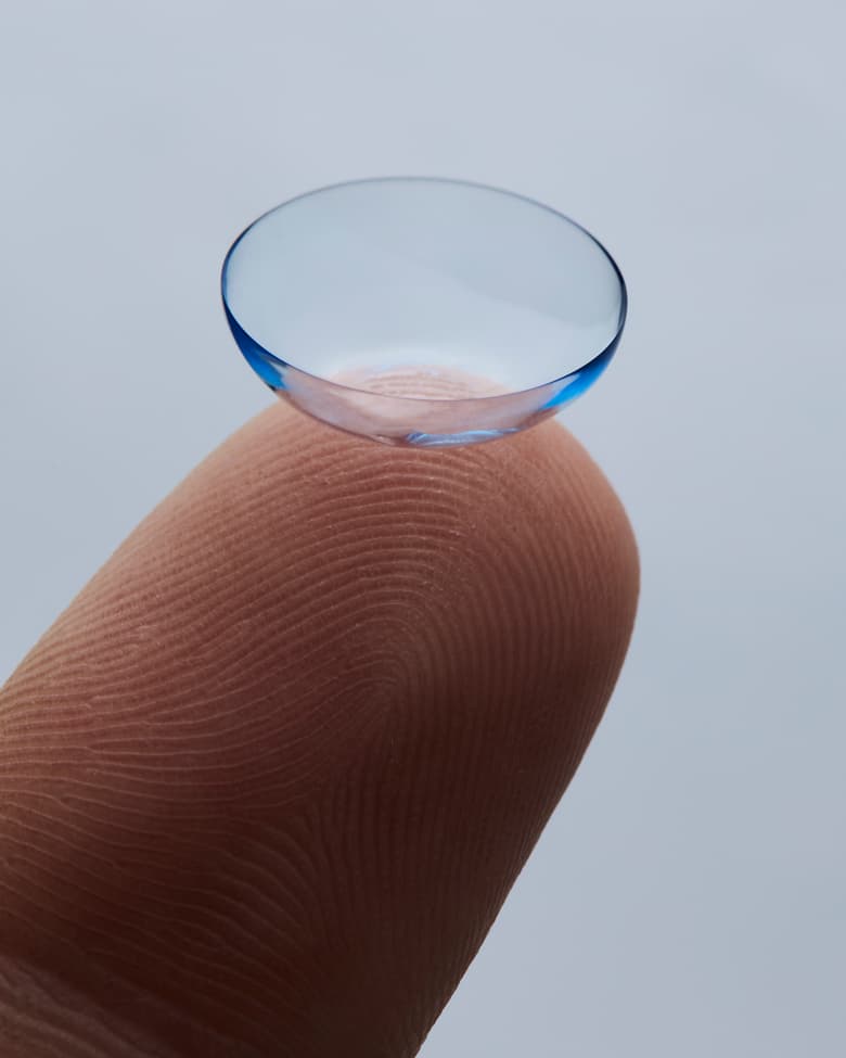 contact lens on a finger mob