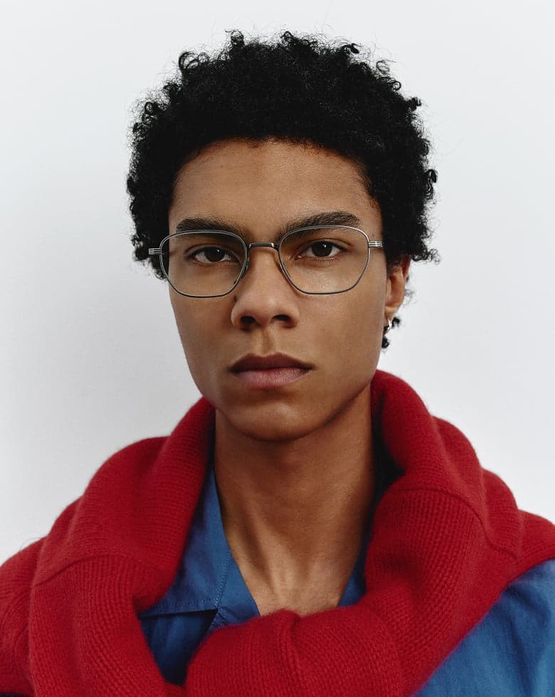 Model wearing Theo glasses