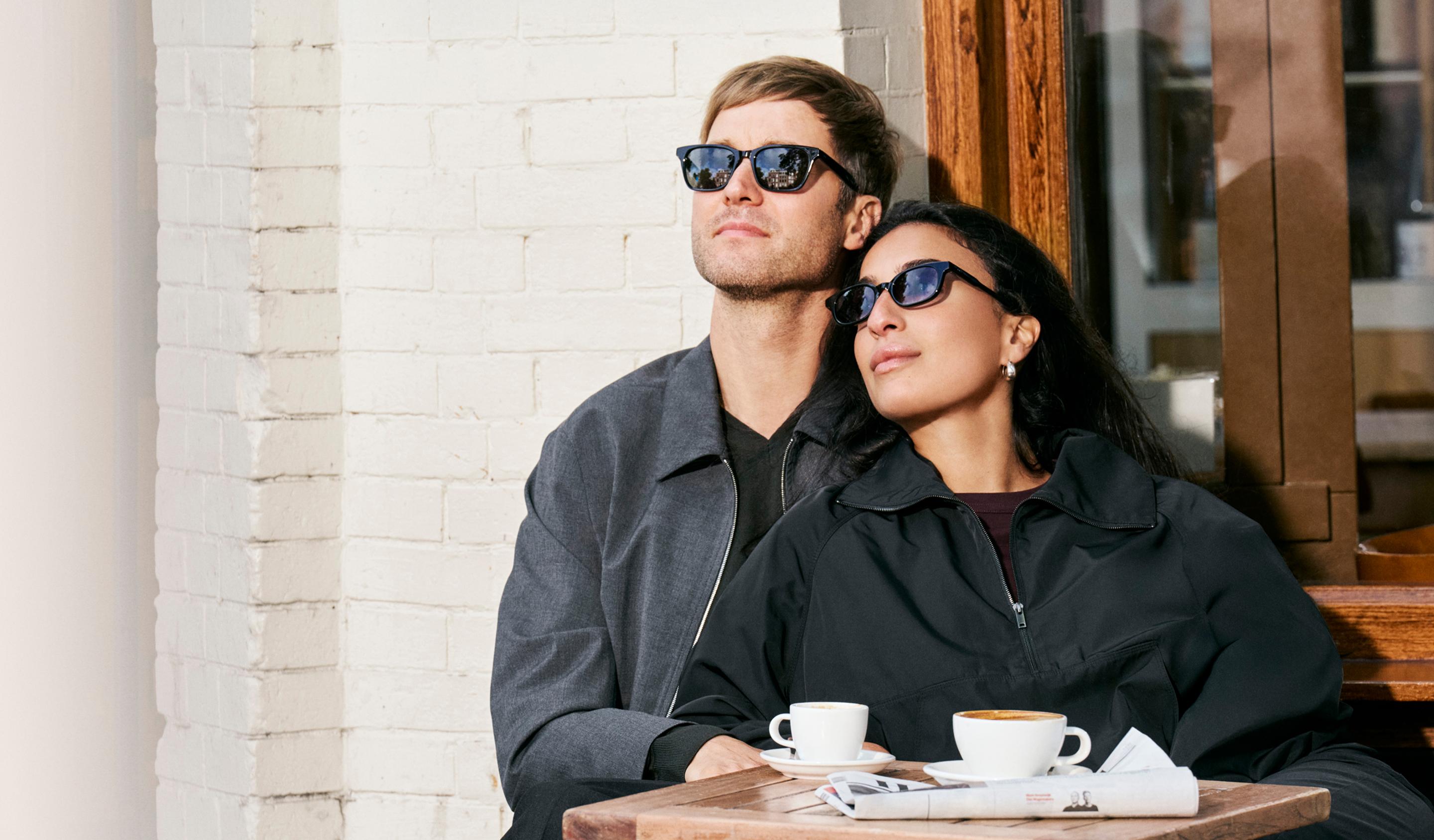 Two models wearing sunglasses
