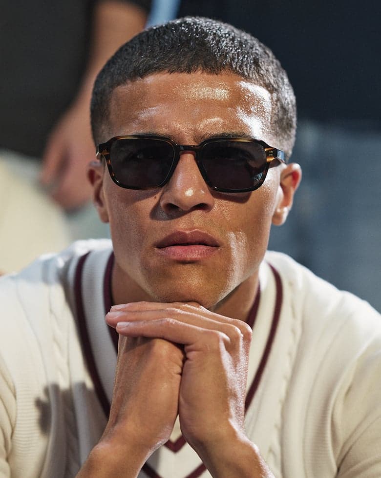 Man with sunglasses in sports clothes